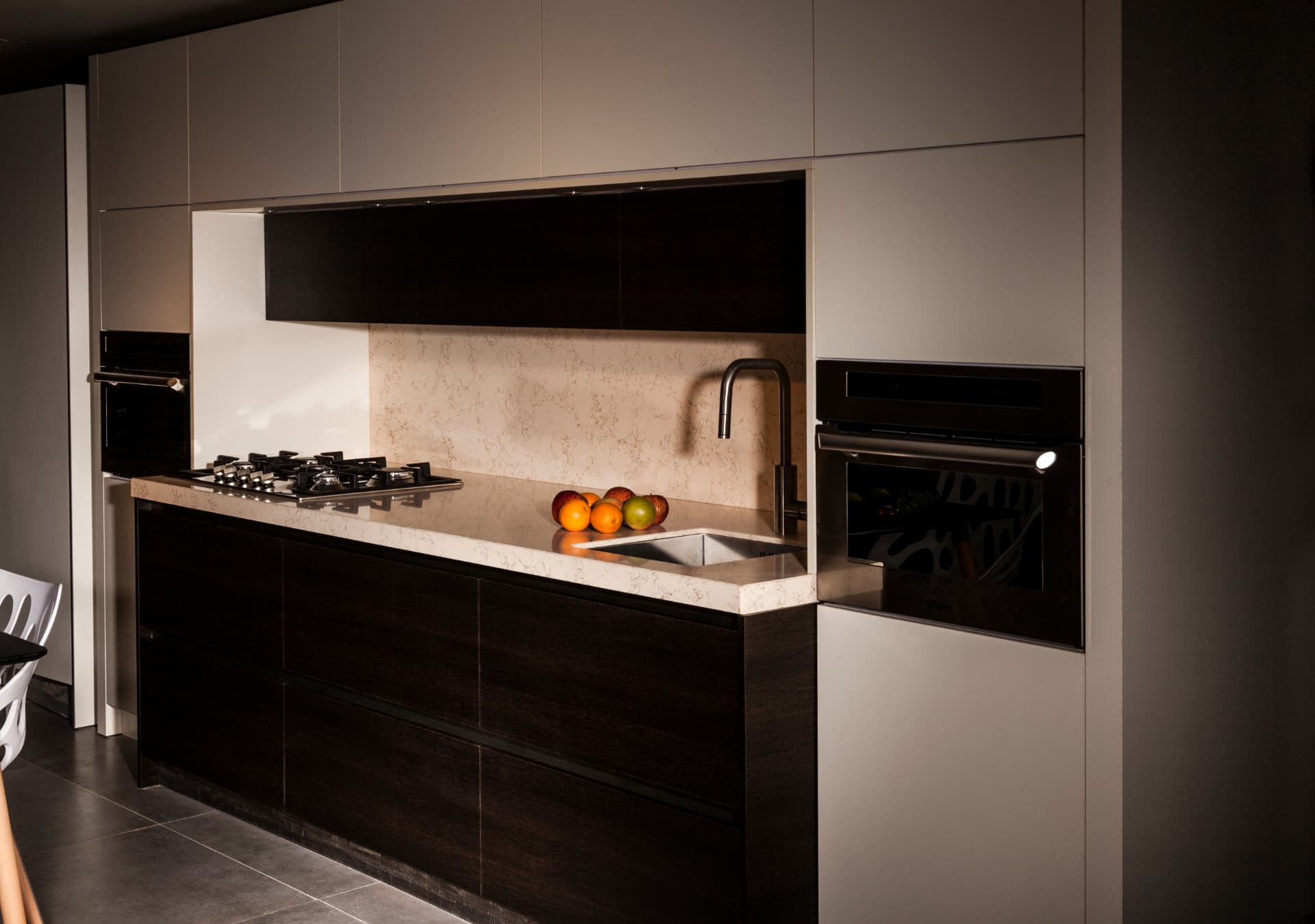 Installed countertop and backsplash in a residential kitchen, view 4