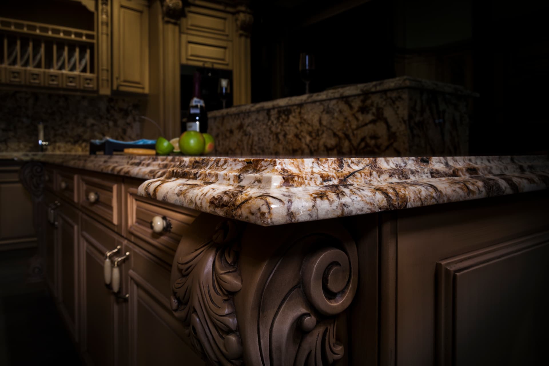 Multi-step stone edge detail on a classic kitchen island