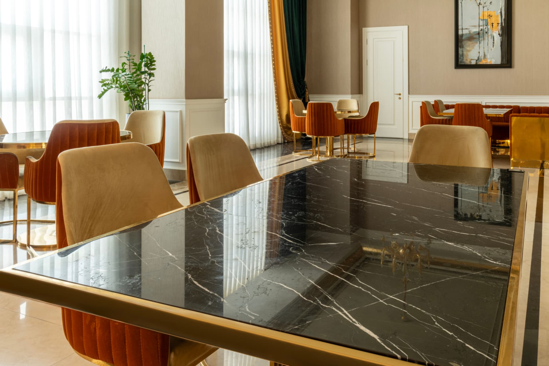 Installed black marble surfaces in a reception space, view 1