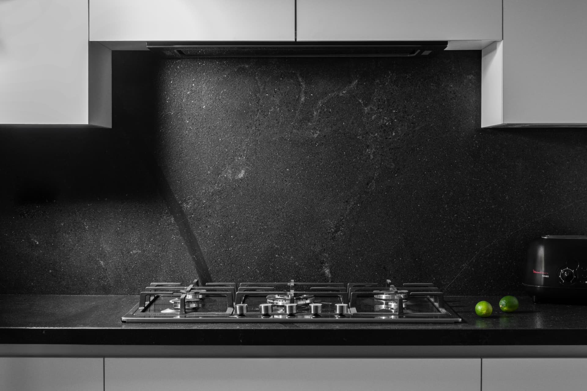 Installed countertop and backsplash in a residential kitchen, view 2