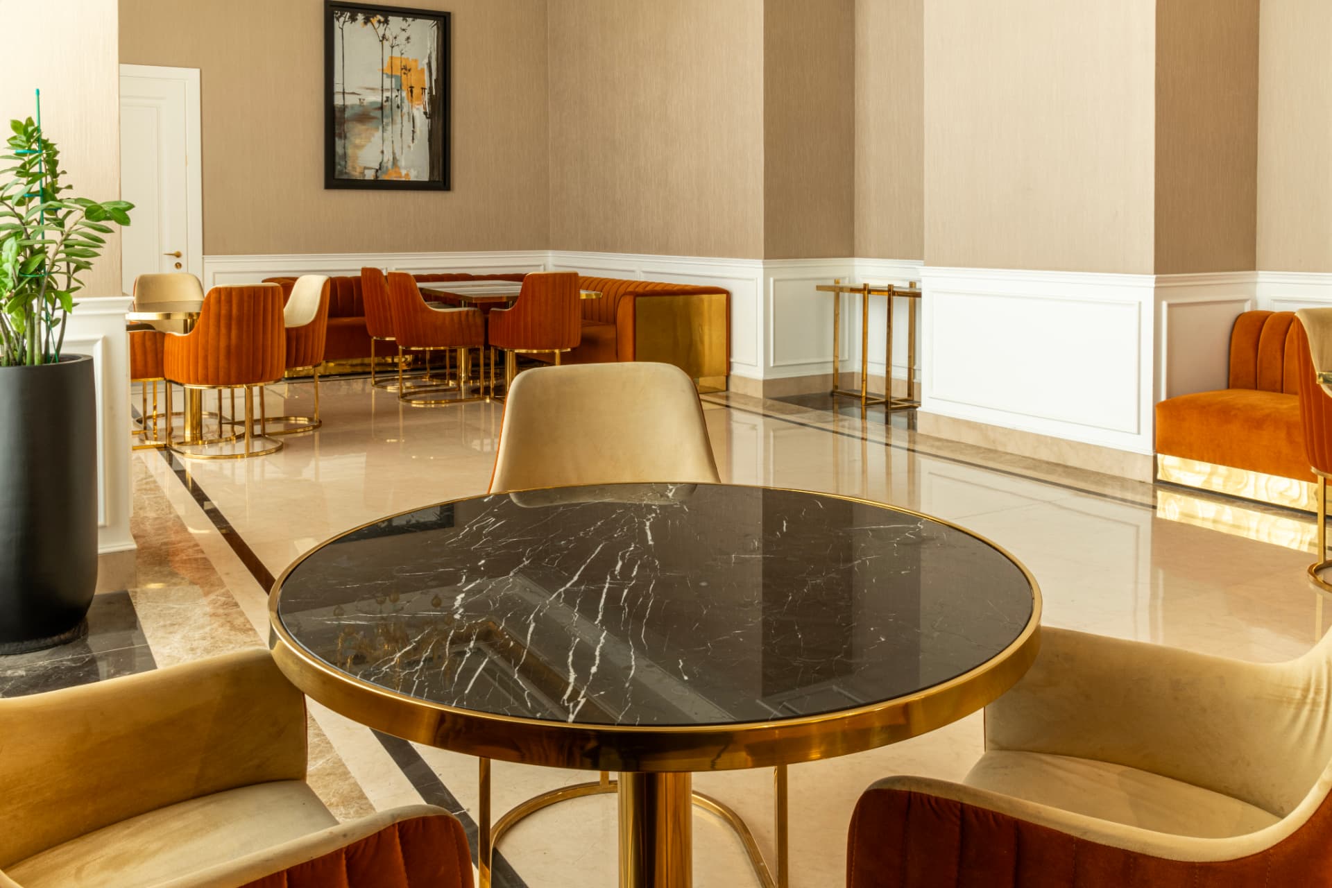 Installed black marble surfaces in a reception space, view 2