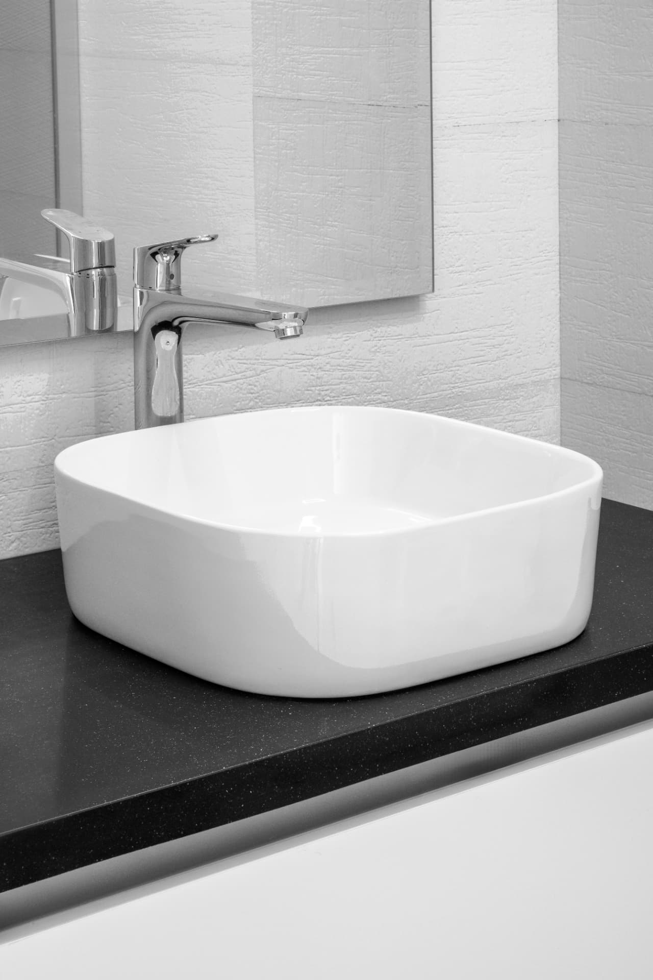 Vessel basin on a dark, speckled surface